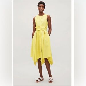 Solitaire Yellow Sleeveless Dress  Pleated
Waist asymmetric size small